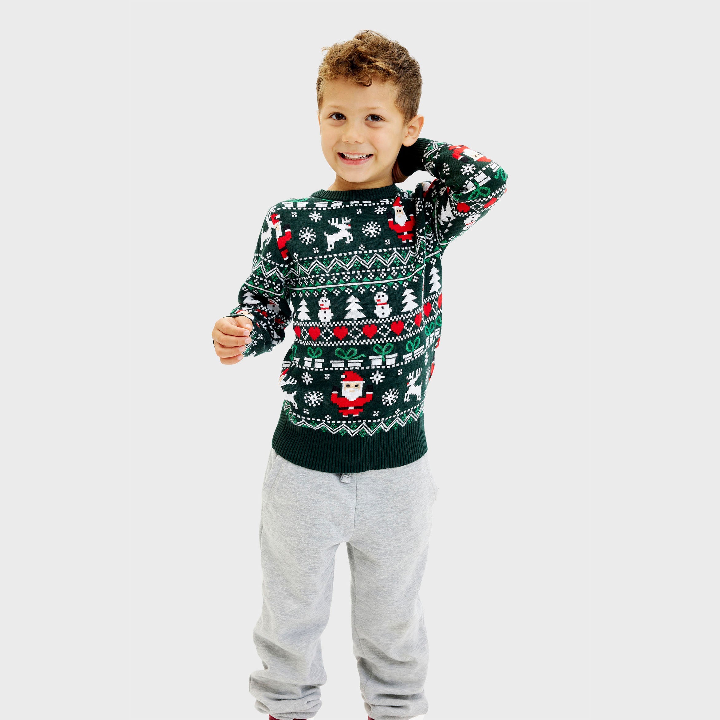 Dunkelgrüner Kinder-Weihnachtspullover mit roten und weißen Weihnachtsmotiven, nachhaltiger Strick.